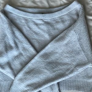 light blue off-the-shoulder sweater